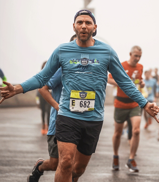 Jean Baptiste participant au semi marathon de New York lors d’un voyage running